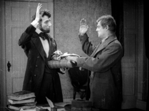 Milt Shanks (Lionel B) is sworn into a secret service by Abraham Lincoln.